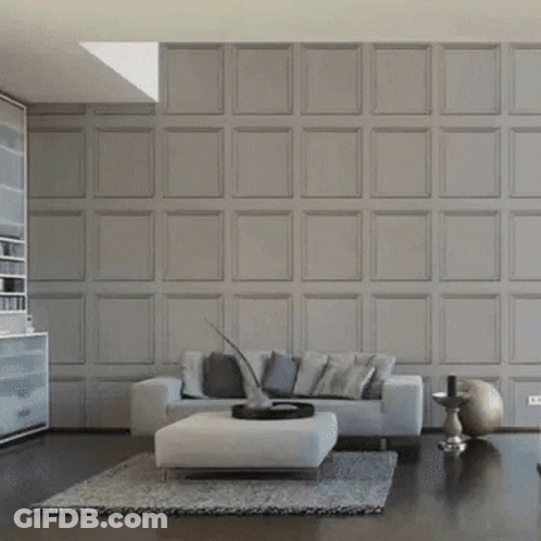 A Picture Of A Man Is Hanging Above A Shelf GIF