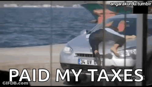 A Picture Of A Man Jumping Into A Car With The Caption Paid My Taxes GIF