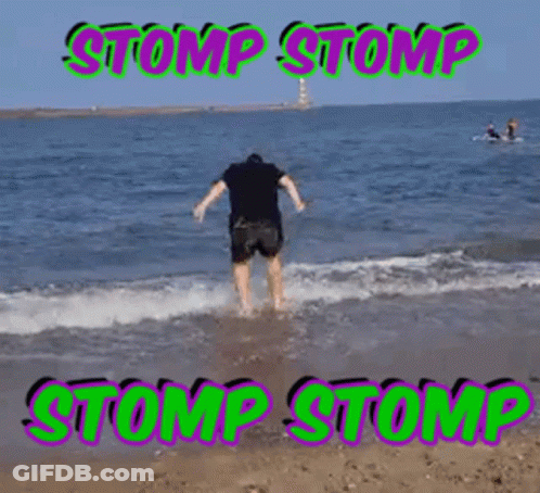 A Picture Of A Man Jumping Into The Ocean With The Words Stomp Stomp On The Bottom GIF
