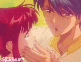 A Picture Of A Man Kissing A Girl With Sugarbundust Written On The Bottom Right GIF