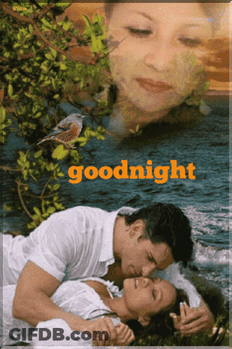 A Picture Of A Man Kissing A Woman With The Words Goodnight Written On The Bottom GIF