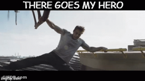 A Picture Of A Man On A Roof With The Words There Goes My Hero Above Him GIF