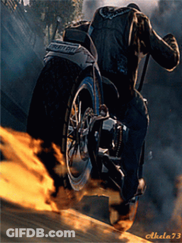 A Picture Of A Man Riding A Motorcycle With The Number 73 On The Bottom Right GIF