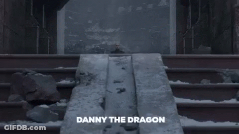 A Picture Of A Man Standing In Front Of A Wall With The Words Dadanny The Dragon On The Bottom GIF