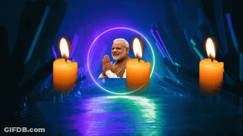 A Picture Of A Man Surrounded By Candles GIF