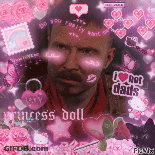 A Picture Of A Man Surrounded By Pink Hearts And Butterflies With The Words " Do You Really Want Me " Written On His Fac GIF