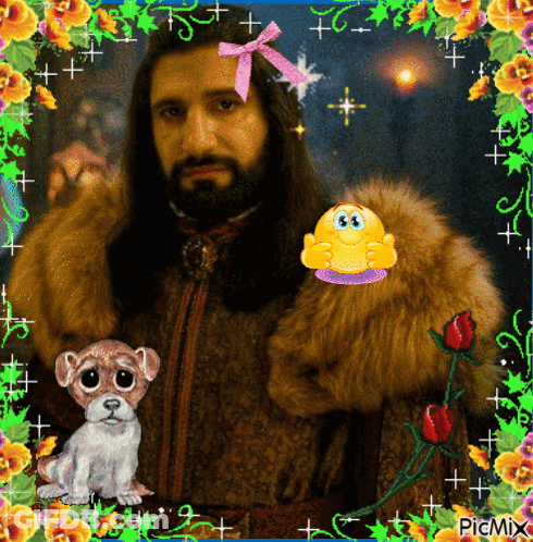 A Picture Of A Man With A Beard Is Surrounded By Flowers And A Cartoon Dog GIF