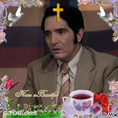 A Picture Of A Man With A Cross On His Head And The Words " Have A Beautiful Day " GIF