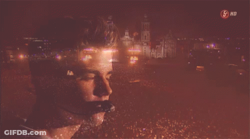 A Picture Of A Man With A Microphone And The Words 5 Hd On The Bottom Right GIF