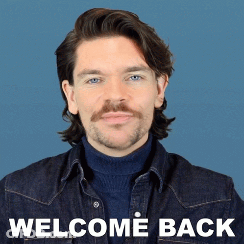 A Picture Of A Man With A Mustache And The Words Welcome Back Below Him GIF