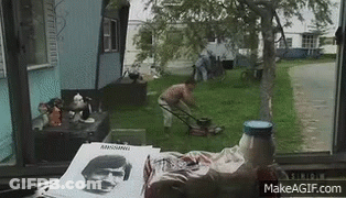 A Picture Of A Man With A Mustache Is On A Table GIF