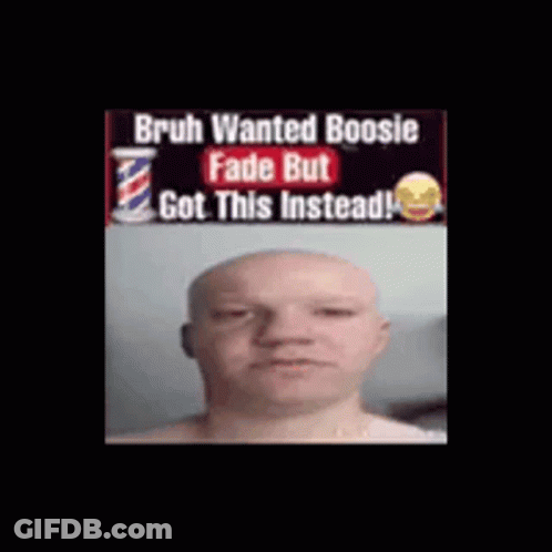 A Picture Of A Man With A Shaved Head And A Barber Pole In The Background GIF