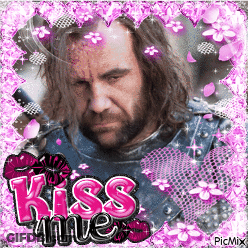 A Picture Of A Man With A Sword And The Words Kiss Me In Pink Letters GIF