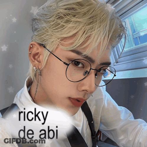 A Picture Of A Man With Glasses And The Name Ricky De Abi On The Bottom GIF