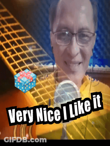 A Picture Of A Man With Glasses And The Words Very Nice I Like It Below Him GIF