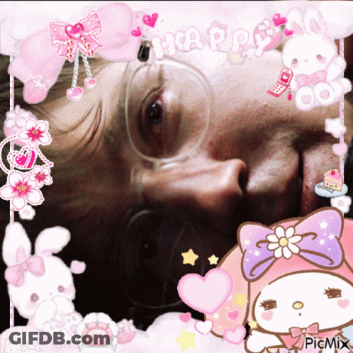A Picture Of A Man With Glasses Surrounded By Pink Hearts And Flowers With The Words Happy On Top GIF