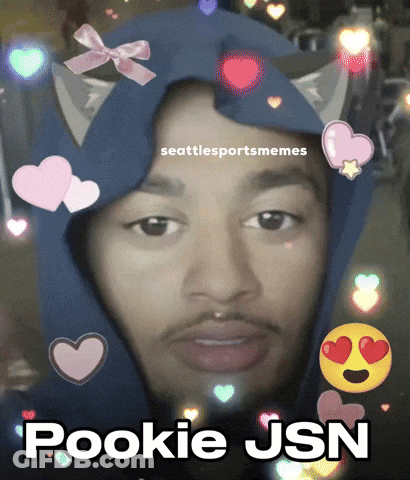 A Picture Of A Man With Hearts Around His Face And The Words Pookie Jsn GIF