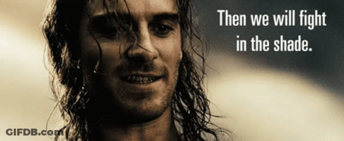 A Picture Of A Man With Long Hair And The Words Then We Will Fight In The Shade GIF