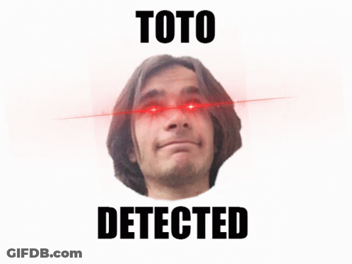 A Picture Of A Man With Red Eyes And The Words Toto Detected Below Him GIF