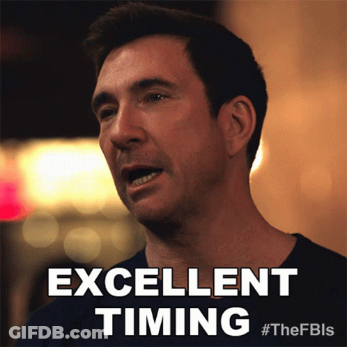 A Picture Of A Man With The Words Excellent Timing Below Him GIF
