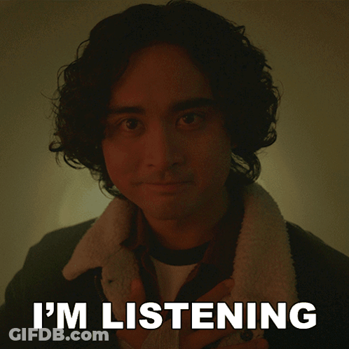A Picture Of A Man With The Words " I 'M Listening " Behind Him GIF