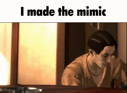 A Picture Of A Man With The Words " I Made The Mimic " Below Him GIF