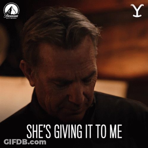 A Picture Of A Man With The Words She 'S Giving It To Me GIF