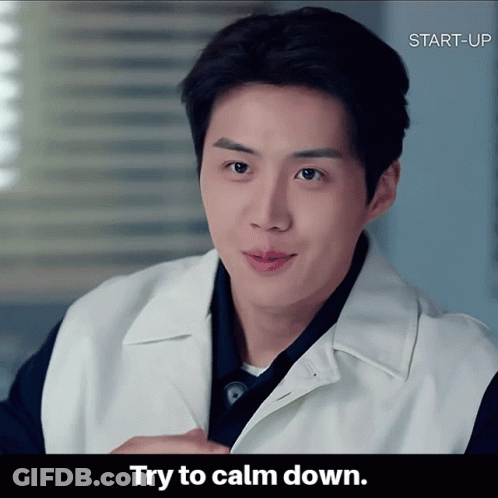 A Picture Of A Man With The Words " Try To Calm Down " On The Bottom GIF