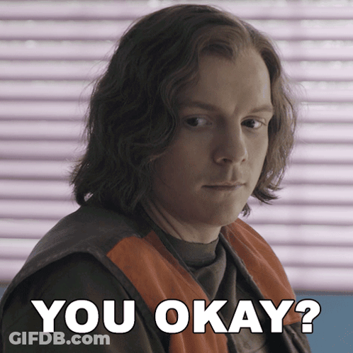 A Picture Of A Man With The Words " You Okay " Above Him GIF