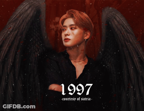 A Picture Of A Man With Wings And The Date 1997 GIF