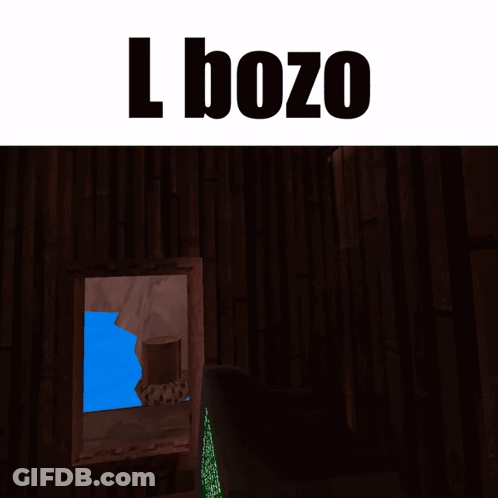 A Picture Of A Monkey Sitting In Front Of A Computer With The Words L Bozo Above It GIF
