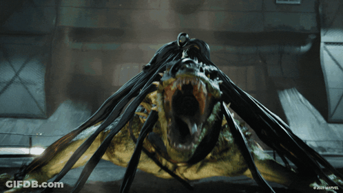 A Picture Of A Monster With A Marvel Logo On The Bottom Right GIF