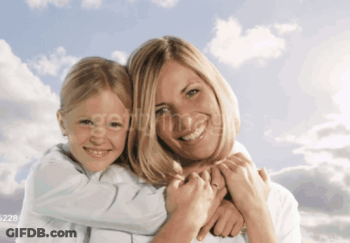 A Picture Of A Mother And Daughter With The Number 528 On The Bottom Left GIF