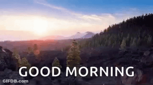 A Picture Of A Mountain Landscape With The Words `` Good Morning '' Written On It . GIF