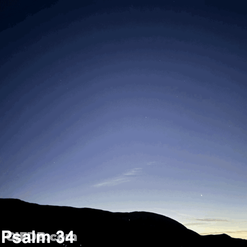 A Picture Of A Mountain With The Words Psalm 34 On The Bottom GIF