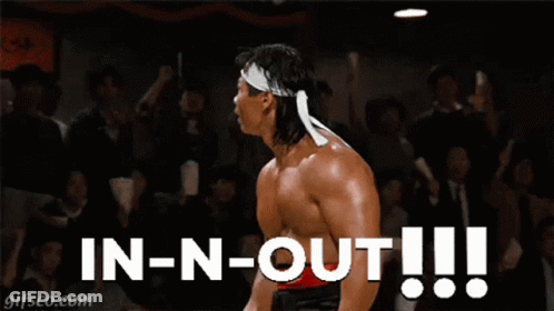 A Picture Of A Muscular Man With The Words In-N-Out Written Below Him GIF