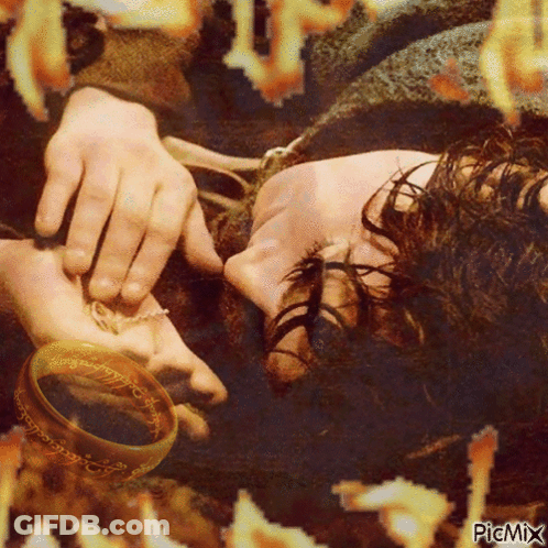 A Picture Of A Person Laying Down With A Ring On Their Hand With Picmix Written On The Bottom GIF