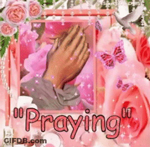 A Picture Of A Person Praying With Roses And Butterflies In The Background GIF