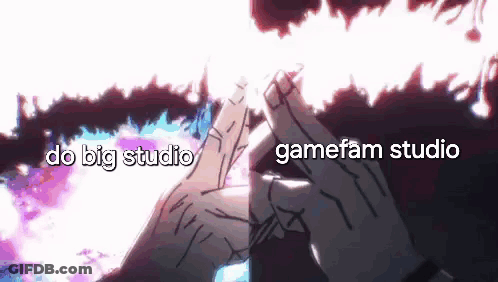 A Picture Of A Person 'S Hands With The Words `` Do Big Studio '' And `` Gamefam Studio '' Written Below Them . GIF