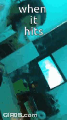 A Picture Of A Person Underwater With The Words When It Hits Written Above Them GIF