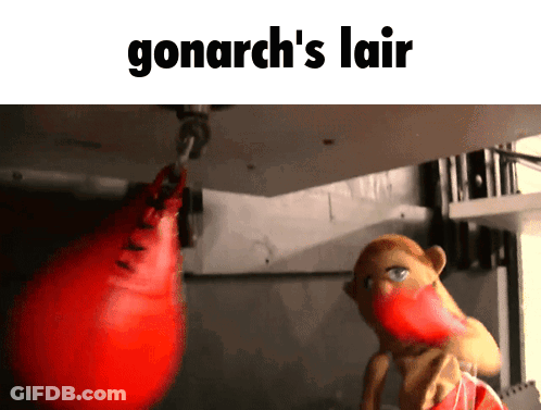 A Picture Of A Puppet Hitting A Punching Bag With The Words Gonarch 'S Lair Above It GIF