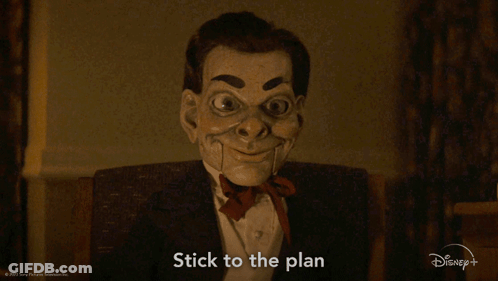 A Picture Of A Puppet With The Words Stick To The Plan On It GIF