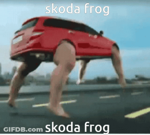 A Picture Of A Red Car With A Person 'S Legs On It GIF