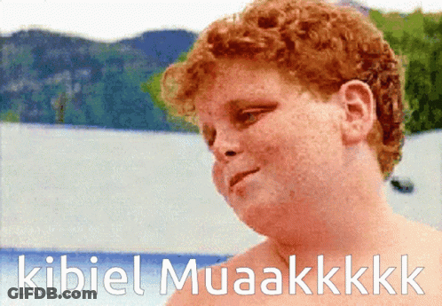A Picture Of A Red Haired Boy With The Words Kibiel Muaakkk Written Below Him GIF