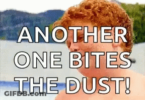 A Picture Of A Red Haired Man With The Words " Another One Bites The Dust " GIF