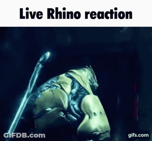 A Picture Of A Rhino With The Words Live Rhino Reaction GIF