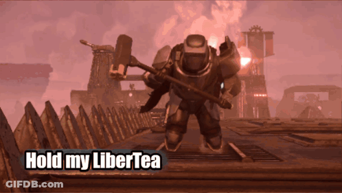 A Picture Of A Robot With The Words Hold My Libertea On It GIF