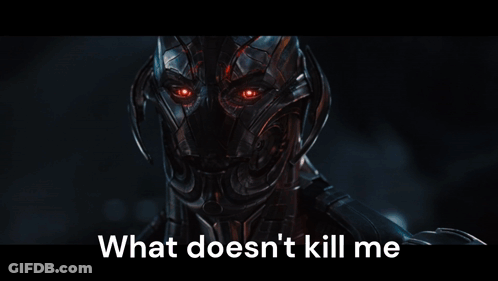 A Picture Of A Robot With The Words " What Does N't Kill Me " On The Bottom GIF