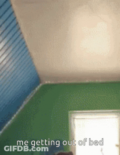 A Picture Of A Room With The Words Me Getting Out Of Bed Written On It GIF