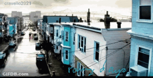 A Picture Of A Row Of Houses With The Caption Cravello2021 On The Bottom GIF